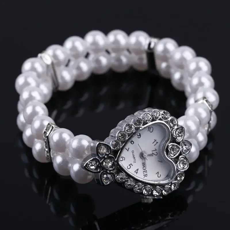 Модные женские часы, женские повседневные наручные часы, браслет с жемчугом и бисером, часы с ремешком, кварцевые наручные часы
Модные женские часы, женские повседневные наручные часы, браслет с жемчугом и бисером, часы с ремешком, кварцевые наручные часы