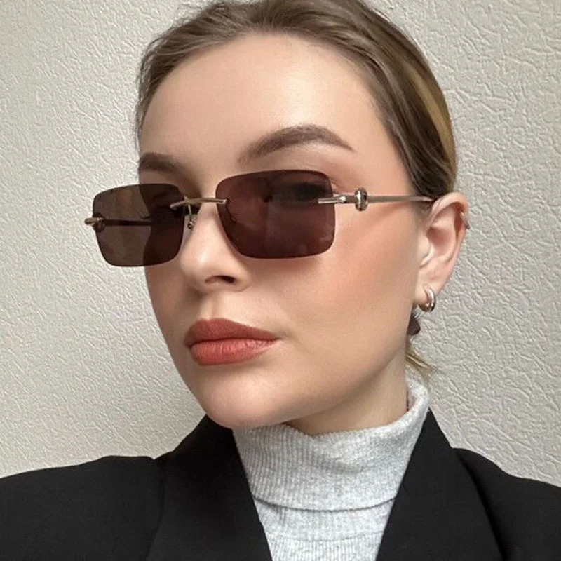 New Rimless Women's Sunglasses Outdoor Sense Retro Sunglasses Metal Frame Men Shades Black Ladies Shades UV400
New Rimless Women's Sunglasses Outdoor Sense Retro Sunglasses Metal Frame Men Shades Black Ladies Shades UV400