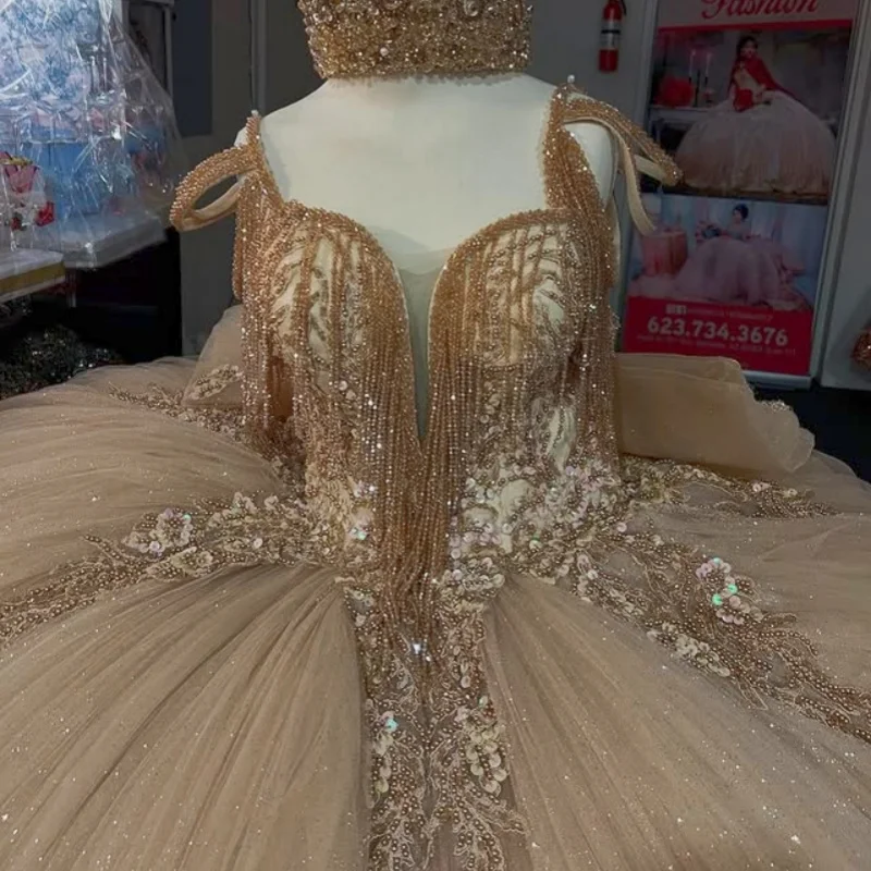 Customized Shiny champagne Dresses Off the Shoulder applique Lace crystal layering Long tail Bow Vestido 15 Quinceanera 
Customized Shiny champagne Dresses Off the Shoulder applique Lace crystal layering Long tail Bow Vestido 15 Quinceanera