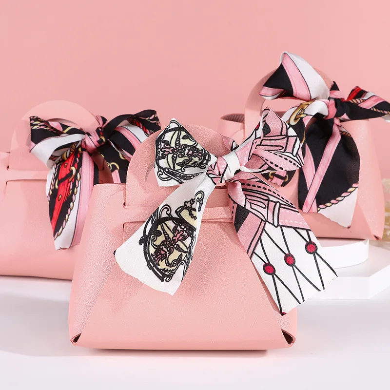 5/10PCS Leather Gift Bag Bow Ribbon Packaging Bag Wedding Favour Distributions Bags Candy Packaging Box Mini Handbag شنط توزيعات
5/10PCS Leather Gift Bag Bow Ribbon Packaging Bag Wedding Favour Distributions Bags Candy Packaging Box Mini Handbag شنط توزيعات