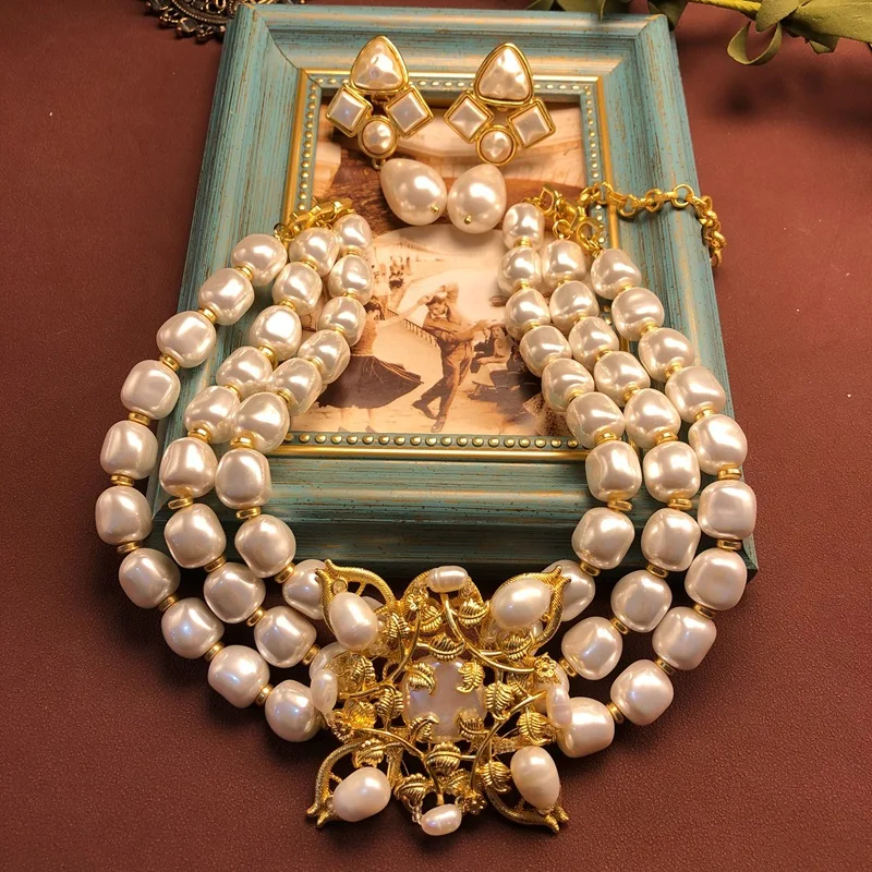 French retro special-shaped pearl gold plated high-grade fashion design choker ear clip all match set
French retro special-shaped pearl gold plated high-grade fashion design choker ear clip all match set