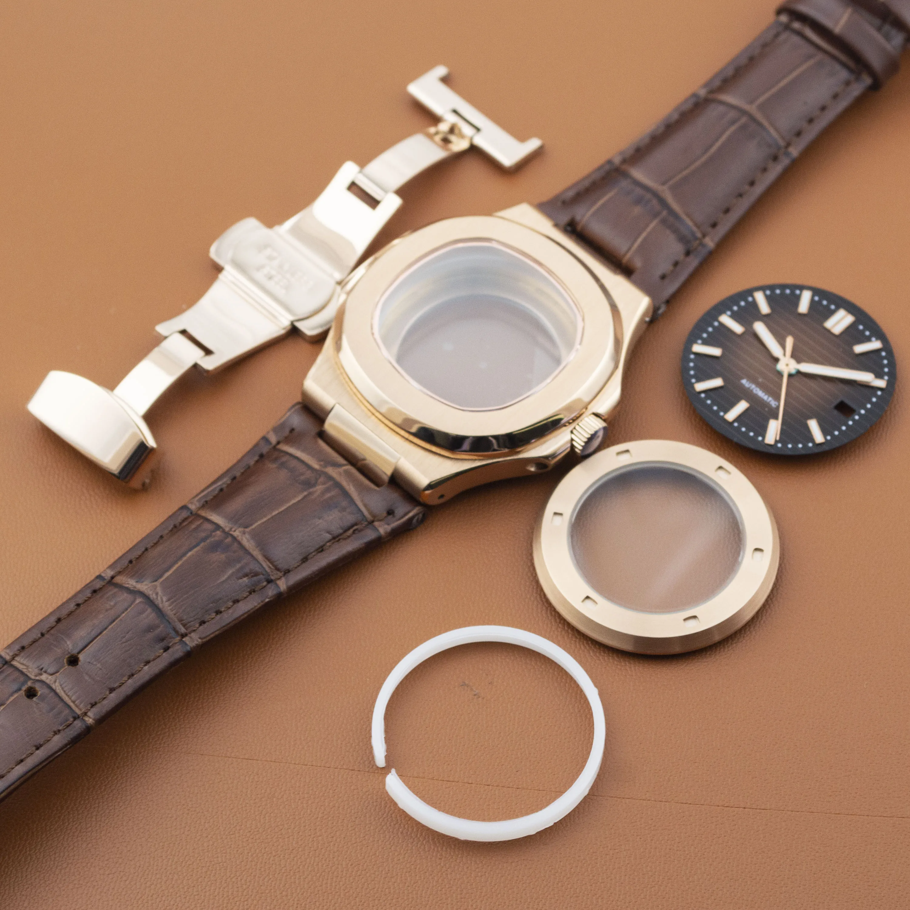 316L Stainless Steel NH35 Rose Case Sapphire Glass Watch Case Genuine Leather Watch Band 31mm Dial Hands for NH35 Movement
316L Stainless Steel NH35 Rose Case Sapphire Glass Watch Case Genuine Leather Watch Band 31mm Dial Hands for NH35 Movement