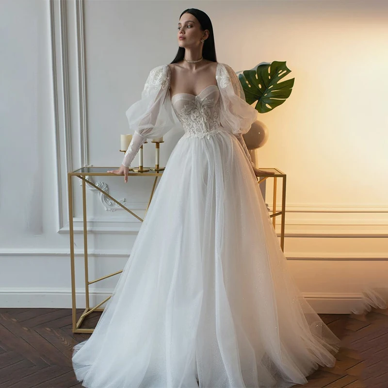 Customized Fairy Romantic Strapless Heart Tulle A-Line Dress Puff Long Sleeve Lace Corset Bridal Attire for Wedding Ceremony
Customized Fairy Romantic Strapless Heart Tulle A-Line Dress Puff Long Sleeve Lace Corset Bridal Attire for Wedding Ceremony