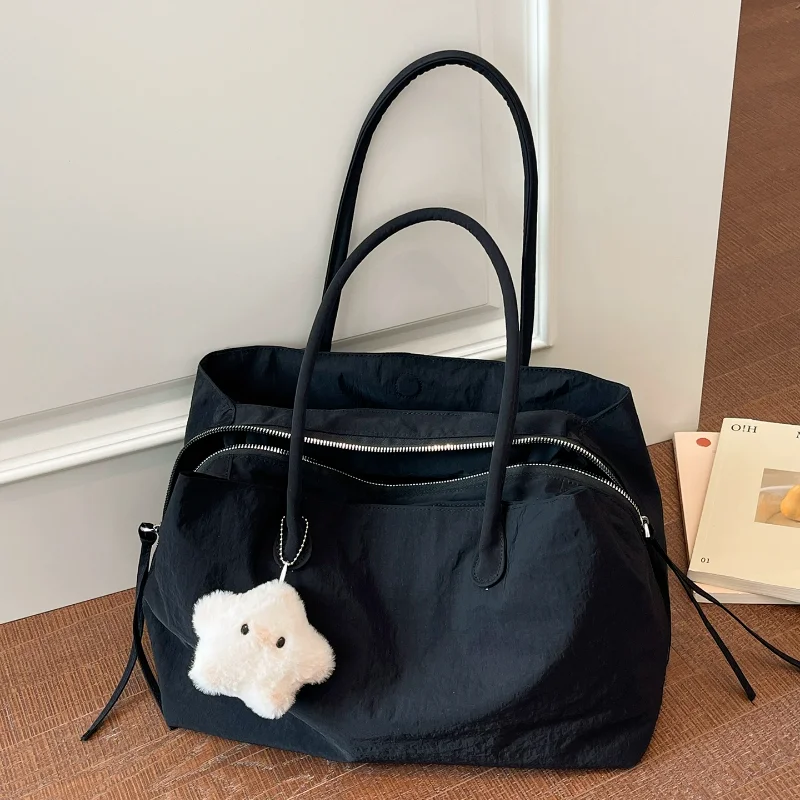 Lightweight Nylon Tote Bag Multi-compartment Large Capacity Solid Color Shoulder Bag With Cute Star Charm Casual Commute Handbag
Lightweight Nylon Tote Bag Multi-compartment Large Capacity Solid Color Shoulder Bag With Cute Star Charm Casual Commute Handbag