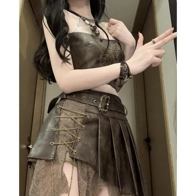 Retro Fashion Spicy Girl Style Leather Halter TopTank Top Irregular Slimming Short Skirt Set Summer Two Piece Set Women Outfits
Retro Fashion Spicy Girl Style Leather Halter TopTank Top Irregular Slimming Short Skirt Set Summer Two Piece Set Women Outfits