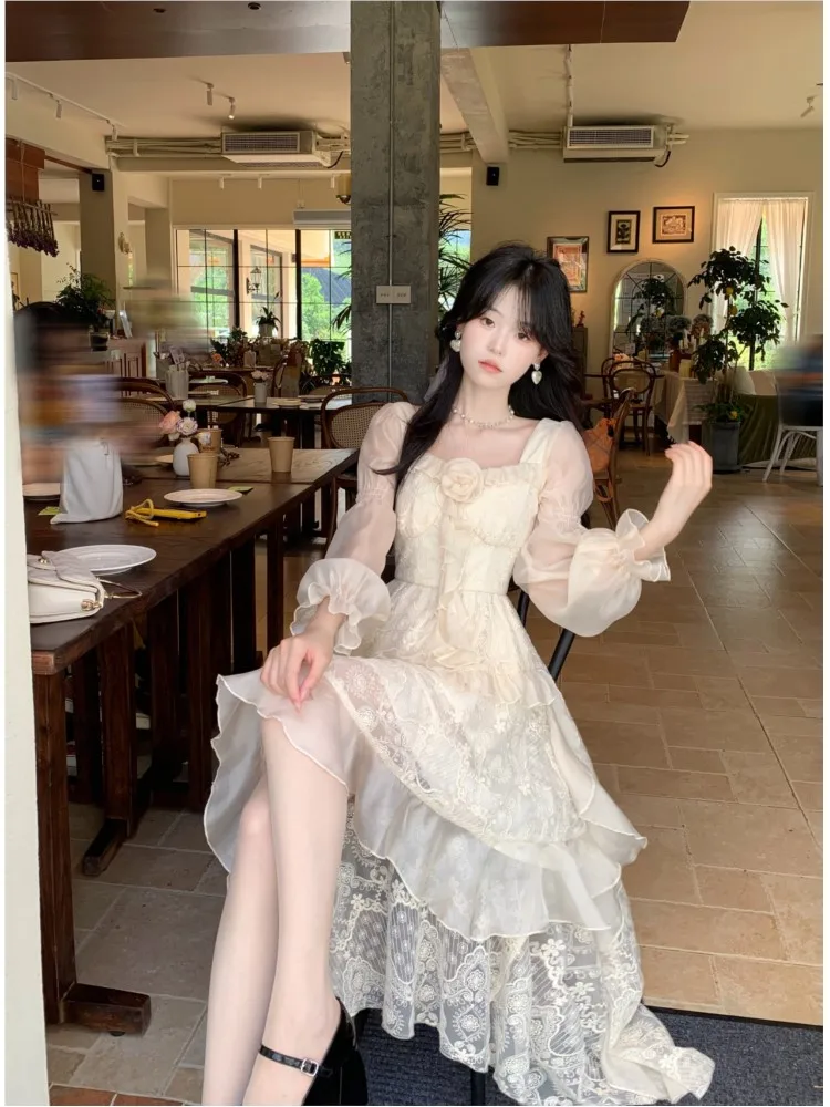 A long-sleeved floral dress with irregular ruffles in design
A long-sleeved floral dress with irregular ruffles in design