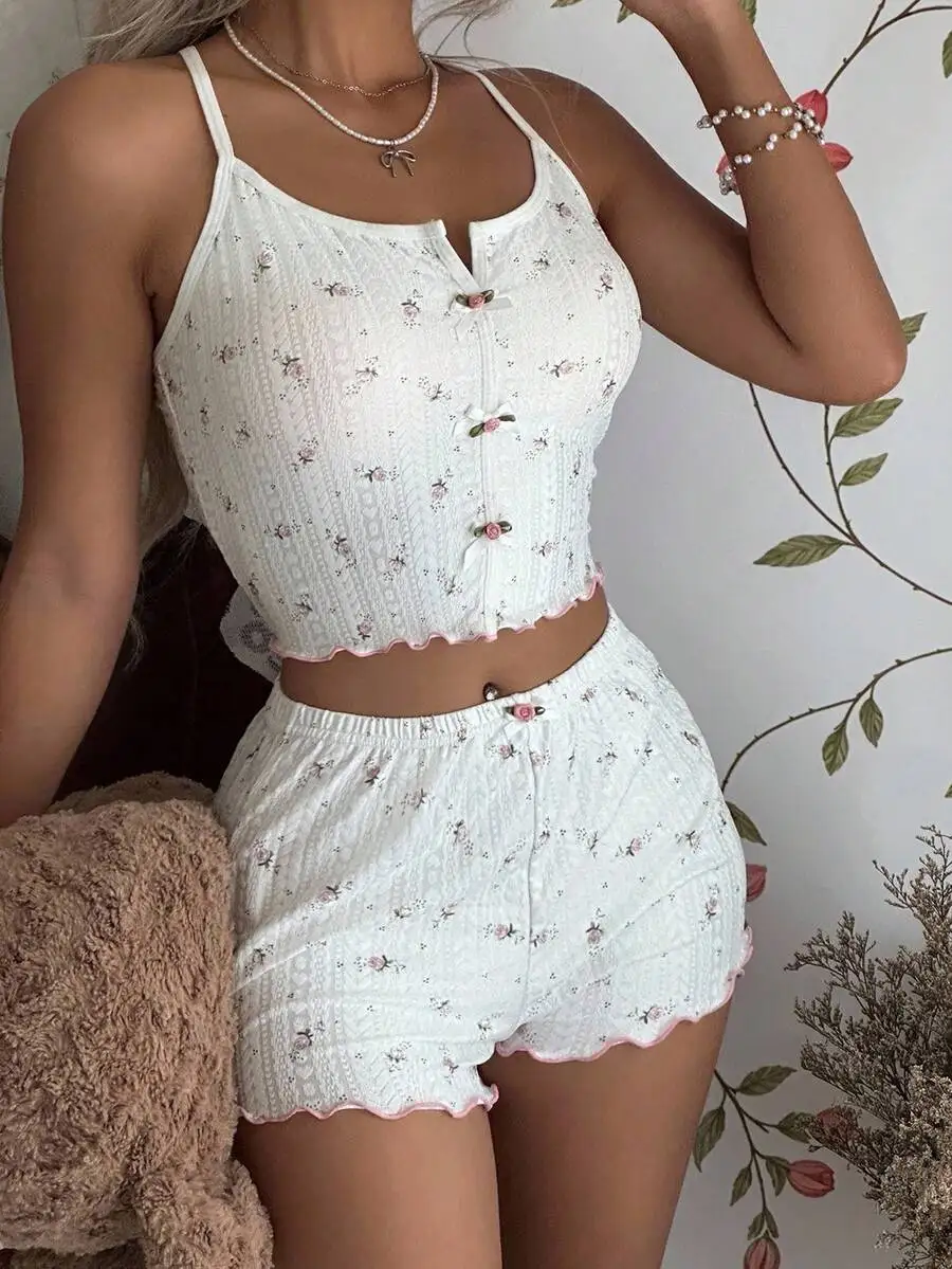 Ditsy Floral Camisole And Shorts Pajama Set With Bow Decor Criss-Cross Back
Ditsy Floral Camisole And Shorts Pajama Set With Bow Decor Criss-Cross Back