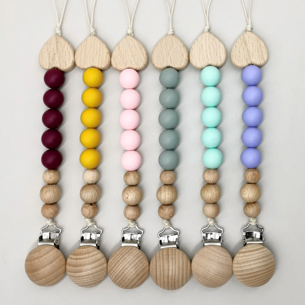 Beech Heart Beads Baby Nipple Chain Wooden Round Pacifier Clip For Silicone Teething Beads Soother Chain Baby Care Toy
Beech Heart Beads Baby Nipple Chain Wooden Round Pacifier Clip For Silicone Teething Beads Soother Chain Baby Care Toy