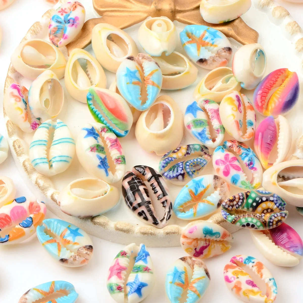 Бусины-ракушки с разнообразным принтом для изготовления ювелирных изделий
Бусины-ракушки с разнообразным принтом для изготовления ювелирных изделий