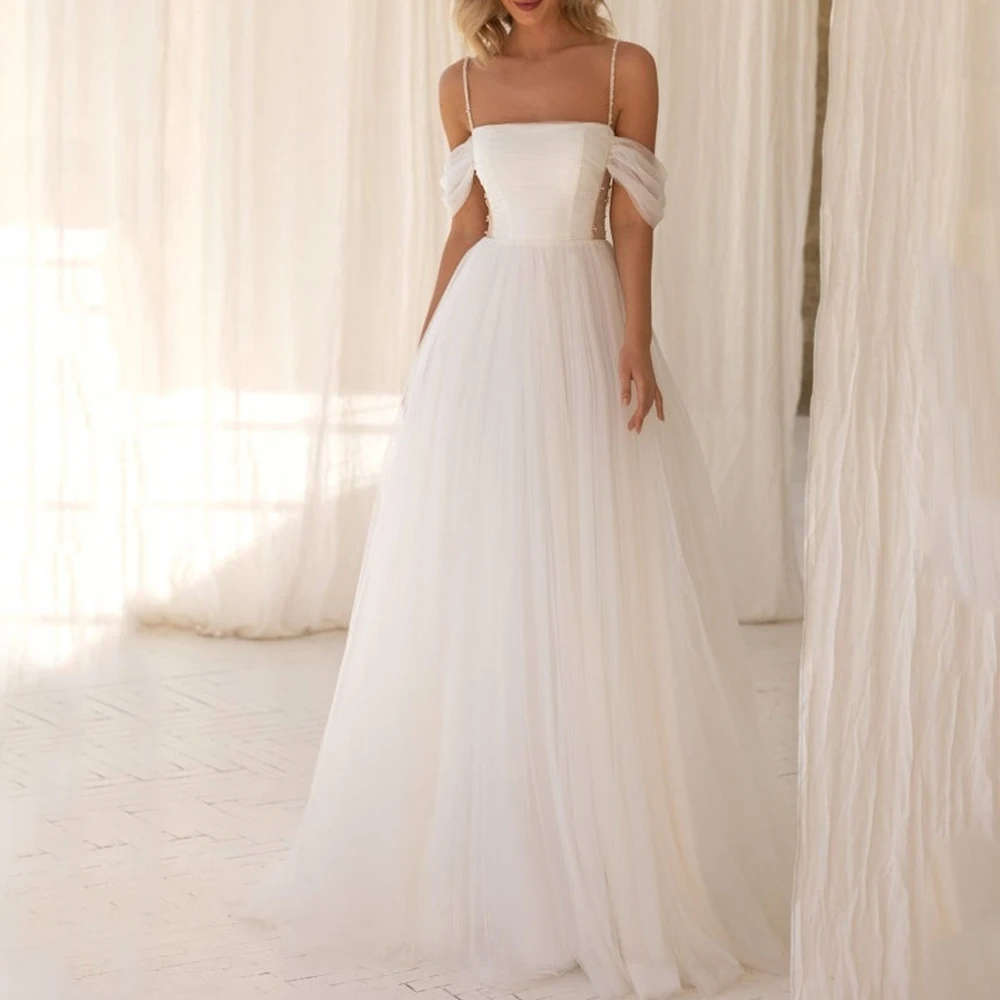 Classic Tulle A-Line Wedding Dress Spaghetti Straps Off the Shoulder Open Back with Sweep Train Bridal Gowns Robe for Marriage
Classic Tulle A-Line Wedding Dress Spaghetti Straps Off the Shoulder Open Back with Sweep Train Bridal Gowns Robe for Marriage