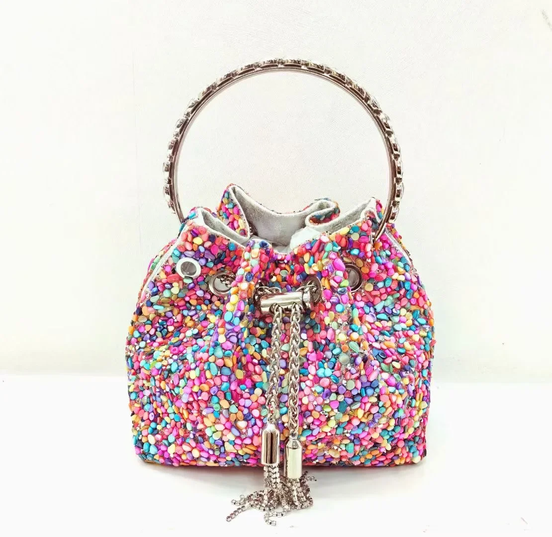 2024 Women's handbag, stone bucket bag, metal circular ring, women's colorful stone diamond bag
2024 Women's handbag, stone bucket bag, metal circular ring, women's colorful stone diamond bag