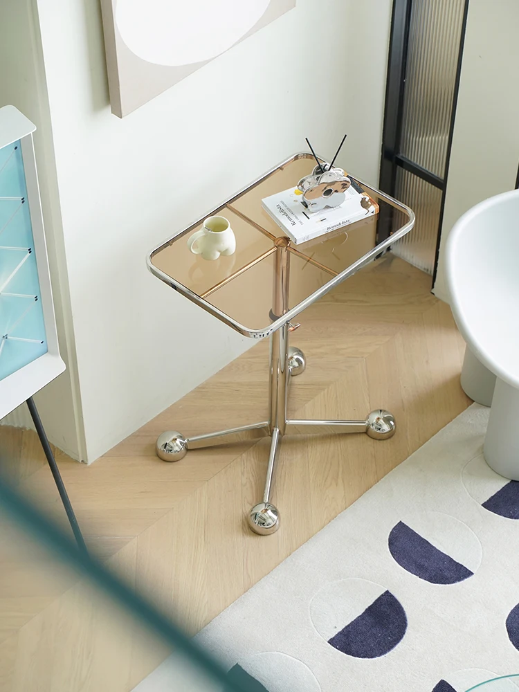 Nordic lifting glass coffee table ins stainless steel household small apartment movable sofa side table
Nordic lifting glass coffee table ins stainless steel household small apartment movable sofa side table