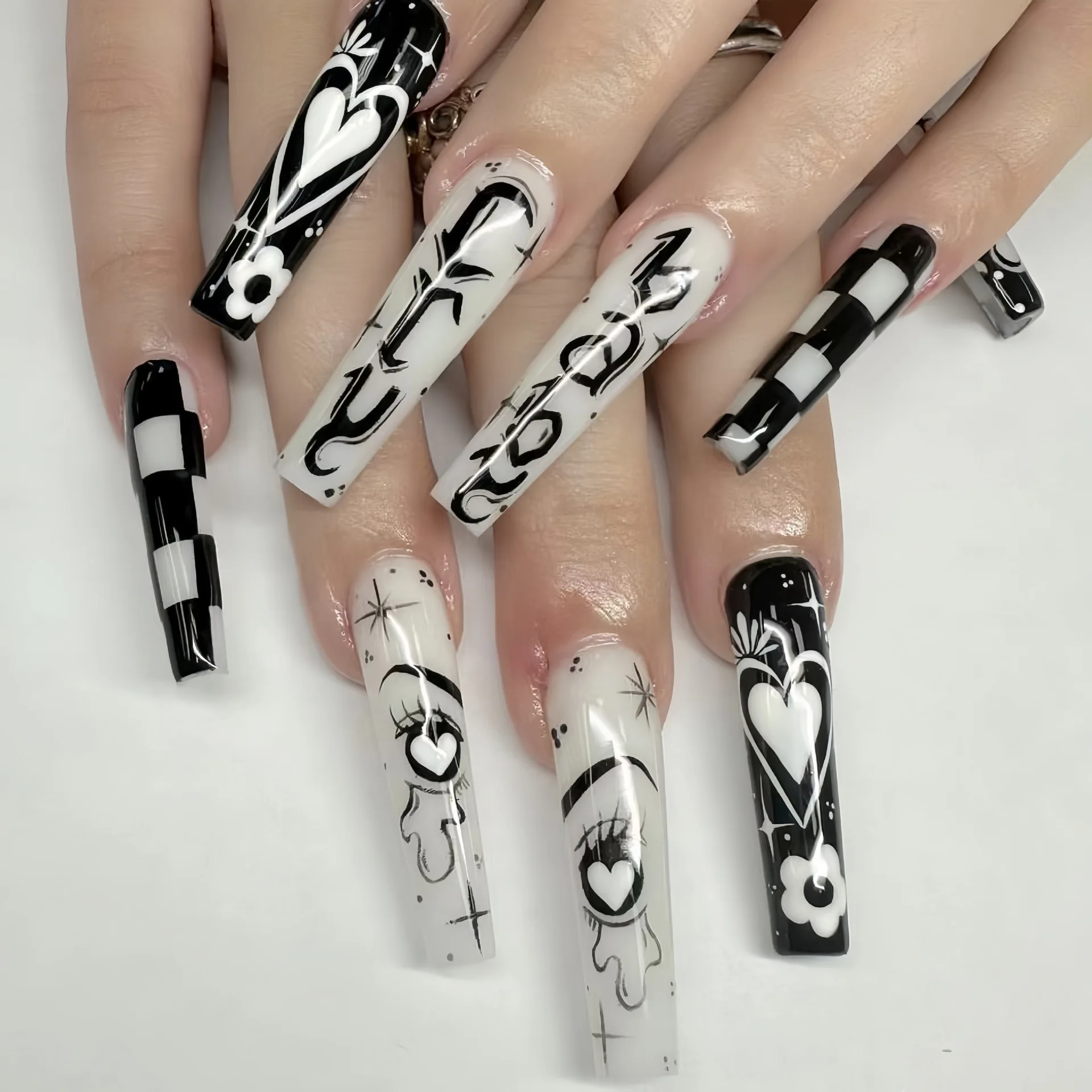 Anime love black and white grid European and American wearing nail film Press on nails Fake nail manicure
Anime love black and white grid European and American wearing nail film Press on nails Fake nail manicure