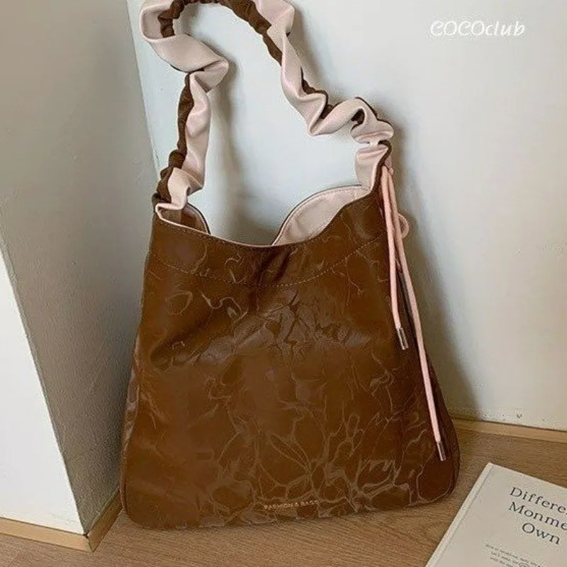 Сумки на плечо большой емкости с застежкой из искусственной кожи, швейные нитки, сумки высокого качества, женские сумки 2025 года, горячая распродажа, универсальные женские сумки
Сумки на плечо большой емкости с застежкой из искусственной кожи, швейные нитки, сумки высокого качества, женские сумки 2025 года, горячая распродажа, универсальные женские сумки