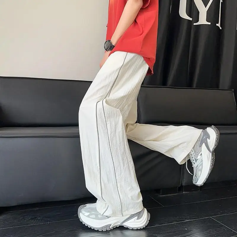 Textured Ice Silk Men's Summer Thin Loose Straight Leg Wide Leg Casual Pants Quick Dry Reflective Fashion Brand Polyester Fiber
Textured Ice Silk Men's Summer Thin Loose Straight Leg Wide Leg Casual Pants Quick Dry Reflective Fashion Brand Polyester Fiber