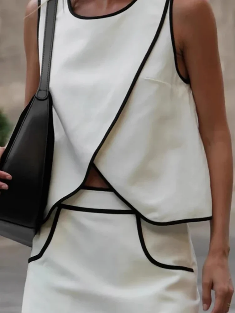 Casual Loose Commuter Outfit Lady O-neck Sleeveless Irregular Top + Skirt Set Summer Minimalist Color Blocked Hollow Street Suit
Casual Loose Commuter Outfit Lady O-neck Sleeveless Irregular Top + Skirt Set Summer Minimalist Color Blocked Hollow Street Suit