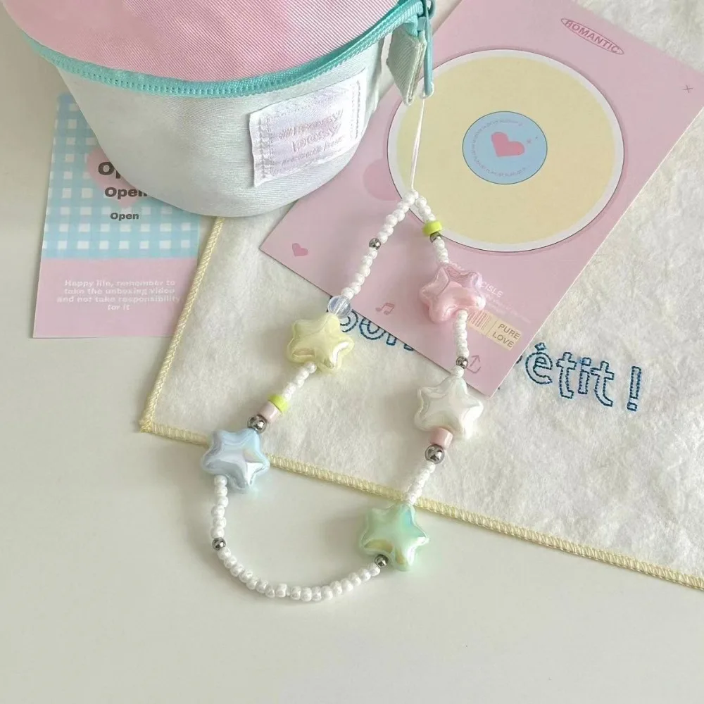 Ремешок для мобильного телефона с кремовой звездой и рисовым шариком, слинг для камеры CCD, сделай сам, ручная работа, расшитый бисером, чехол для мобильного телефона, слинг, не ослабляющая веревка.
Ремешок для мобильного телефона с кремовой звездой и рисовым шариком, слинг для камеры CCD, сделай сам, ручная работа, расшитый бисером, чехол для мобильного телефона, слинг, не ослабляющая веревка.