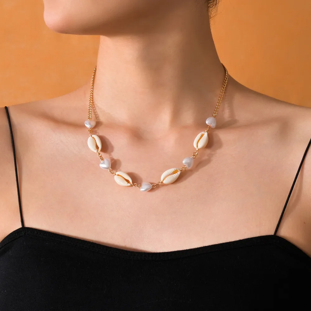 Bohemian Vacation Style Love Pearl Shell Alloy Necklace Unisex Suitable for Beach Vacation Parties
Bohemian Vacation Style Love Pearl Shell Alloy Necklace Unisex Suitable for Beach Vacation Parties