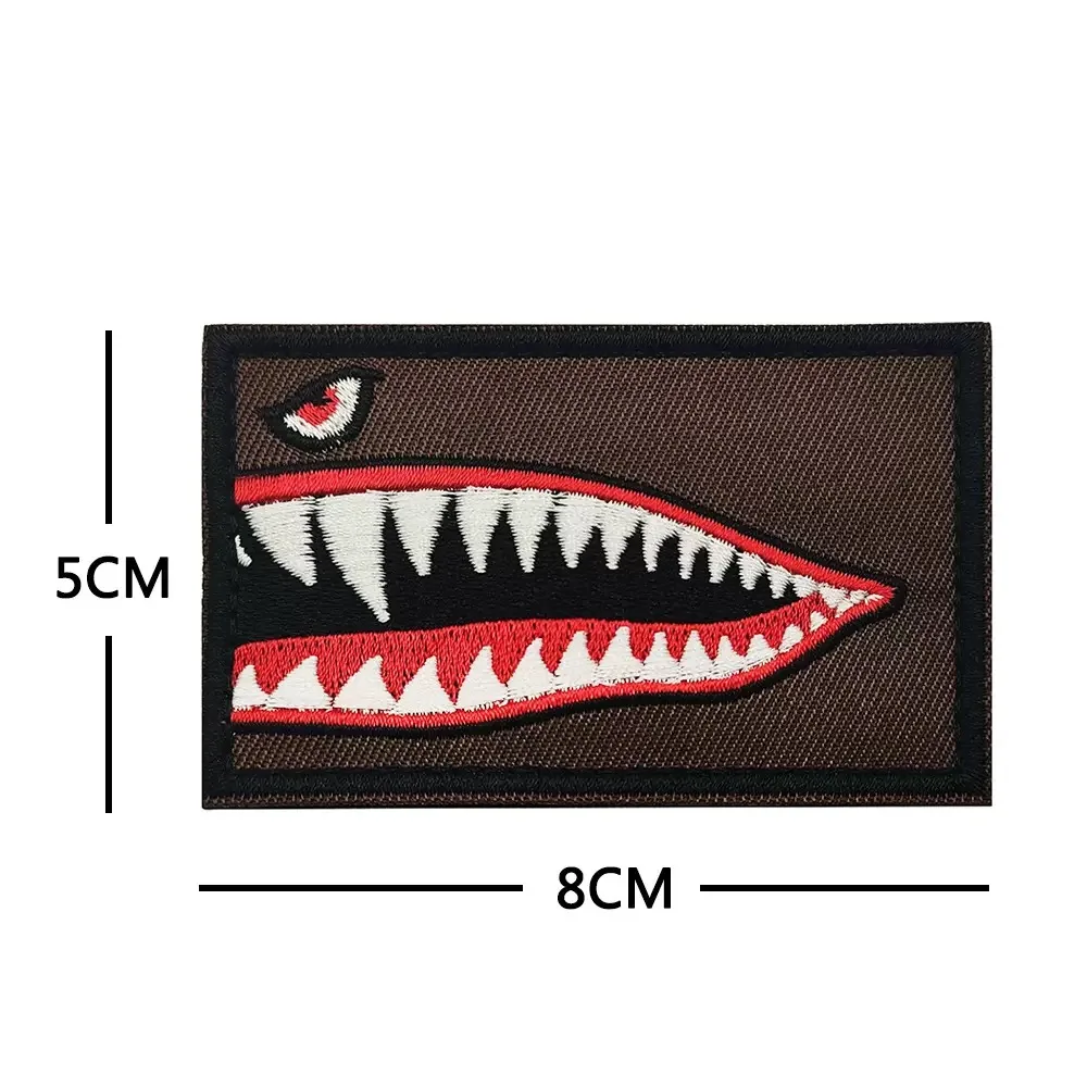 8x5cm Brown Base Flying Tiger Shark Mouth Embroidered patch hook and loop fasteners Funny Morale badge. DIY for jacket backpack
8x5cm Brown Base Flying Tiger Shark Mouth Embroidered patch hook and loop fasteners Funny Morale badge. DIY for jacket backpack