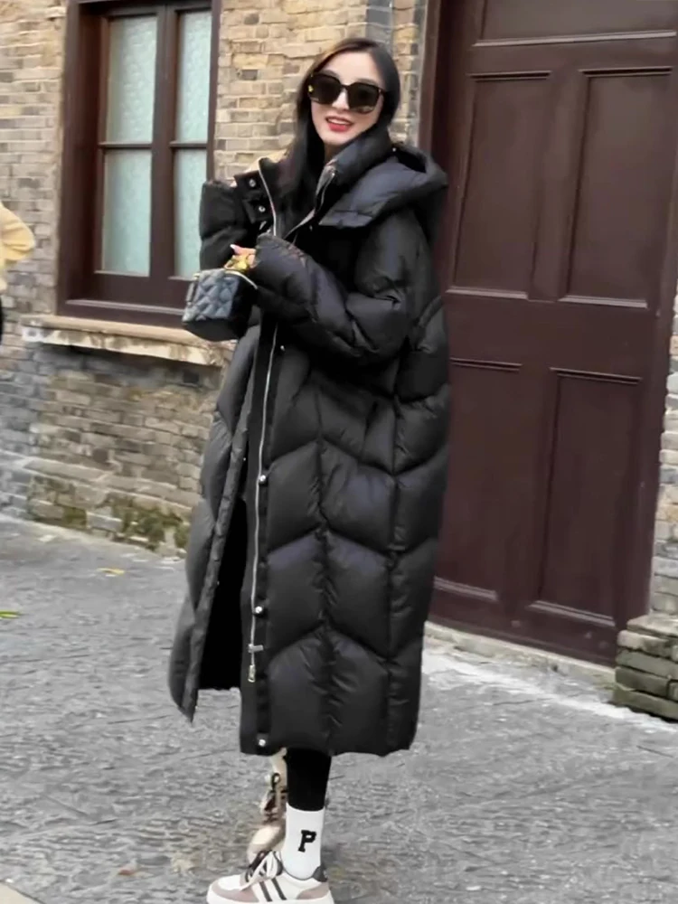 Зима 2025: Женское свободное теплое пуховое пальто с капюшоном, черное, до колен, с наполнителем из белого утиного пуха, для повседневной носки, в корейском стиле
Зима 2025: Женское свободное теплое пуховое пальто с капюшоном, черное, до колен, с наполнителем из белого утиного пуха, для повседневной носки, в корейском стиле