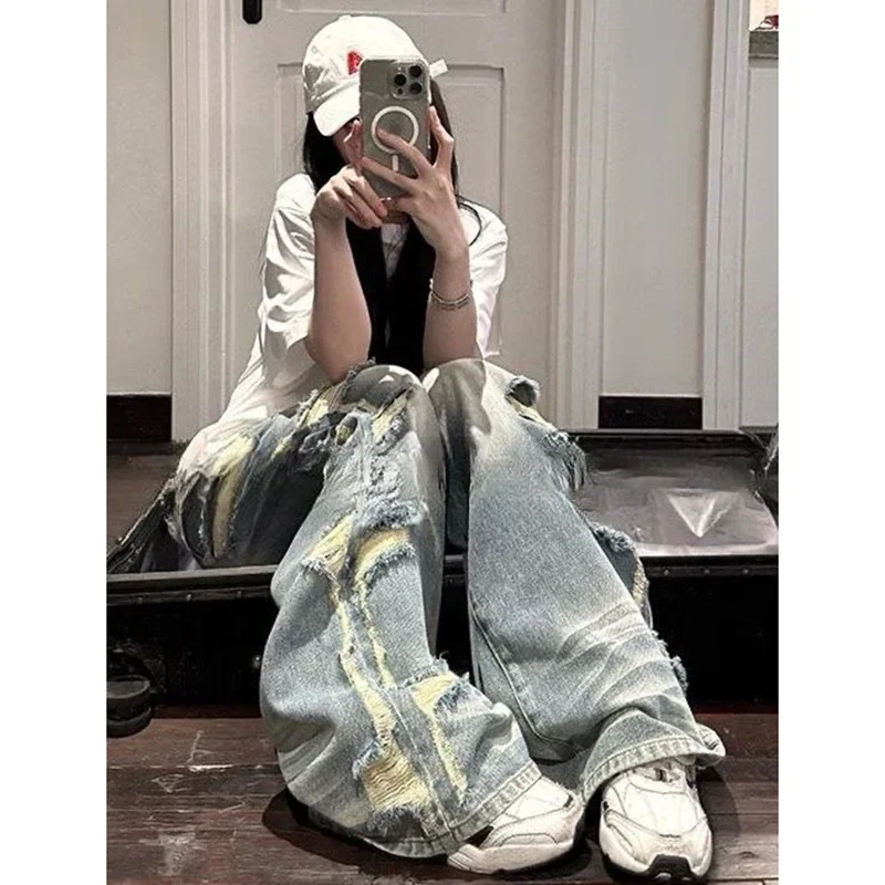 Streetwear Vintage Blue Ripped Jeans Women High Waist Straight Baggy Denim Pants Y2K American Retro Wide Leg Denim Trousers
Streetwear Vintage Blue Ripped Jeans Women High Waist Straight Baggy Denim Pants Y2K American Retro Wide Leg Denim Trousers