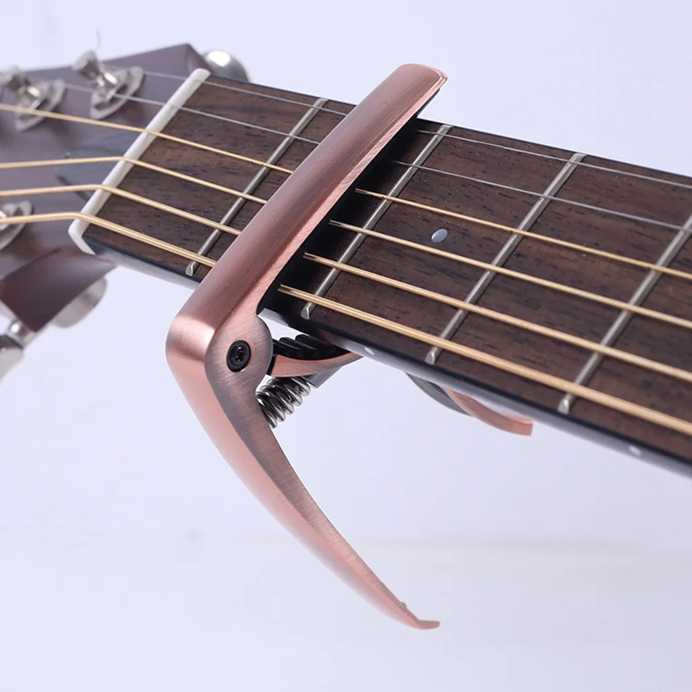 Guitar Capo for Acoustic Classical Electric Ukulele Folk Metal Tuner Clamp Accessories Red Bronze Guitar Parts
Guitar Capo for Acoustic Classical Electric Ukulele Folk Metal Tuner Clamp Accessories Red Bronze Guitar Parts