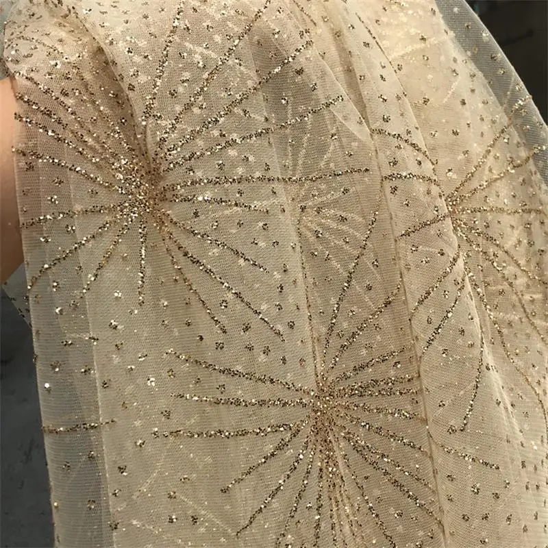 Sequins Mesh Fabric Hot Stamping Fireworks Pattern Wedding Dress Stage Performance Decoration Fabric Champagne Color Gold
Sequins Mesh Fabric Hot Stamping Fireworks Pattern Wedding Dress Stage Performance Decoration Fabric Champagne Color Gold