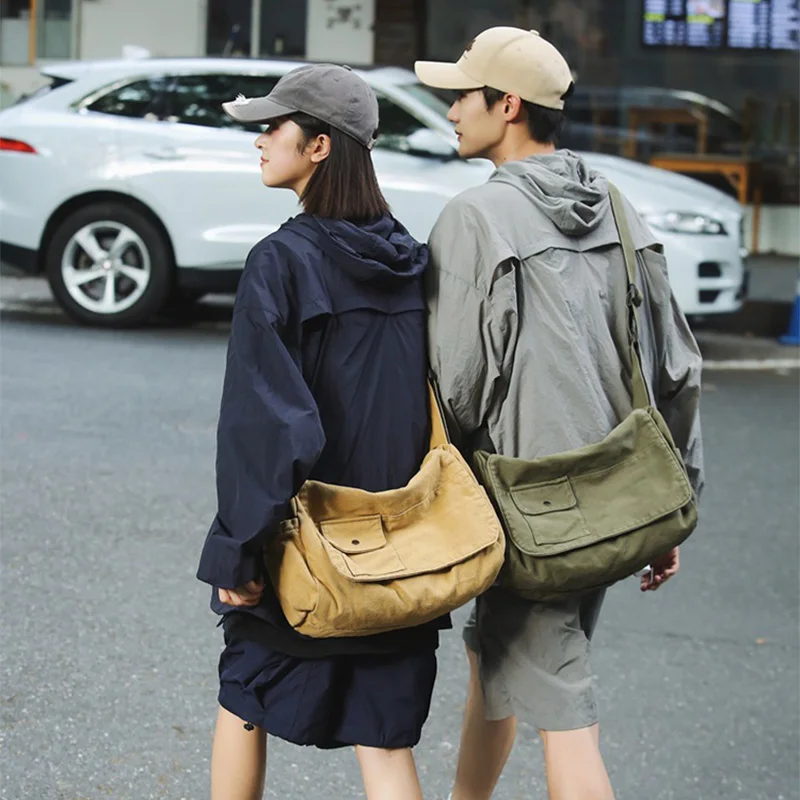 Japanese Casual Square Bag New Solid Color Wash Canvas Shoulder Messenger Bag Multifunctional Adjustable Large-capacity Flip Bag
Japanese Casual Square Bag New Solid Color Wash Canvas Shoulder Messenger Bag Multifunctional Adjustable Large-capacity Flip Bag