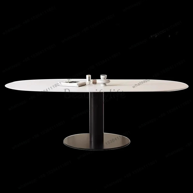 Italian minimalist rock slab dining table and chair combination oval table small apartment family dining table light luxury
Italian minimalist rock slab dining table and chair combination oval table small apartment family dining table light luxury