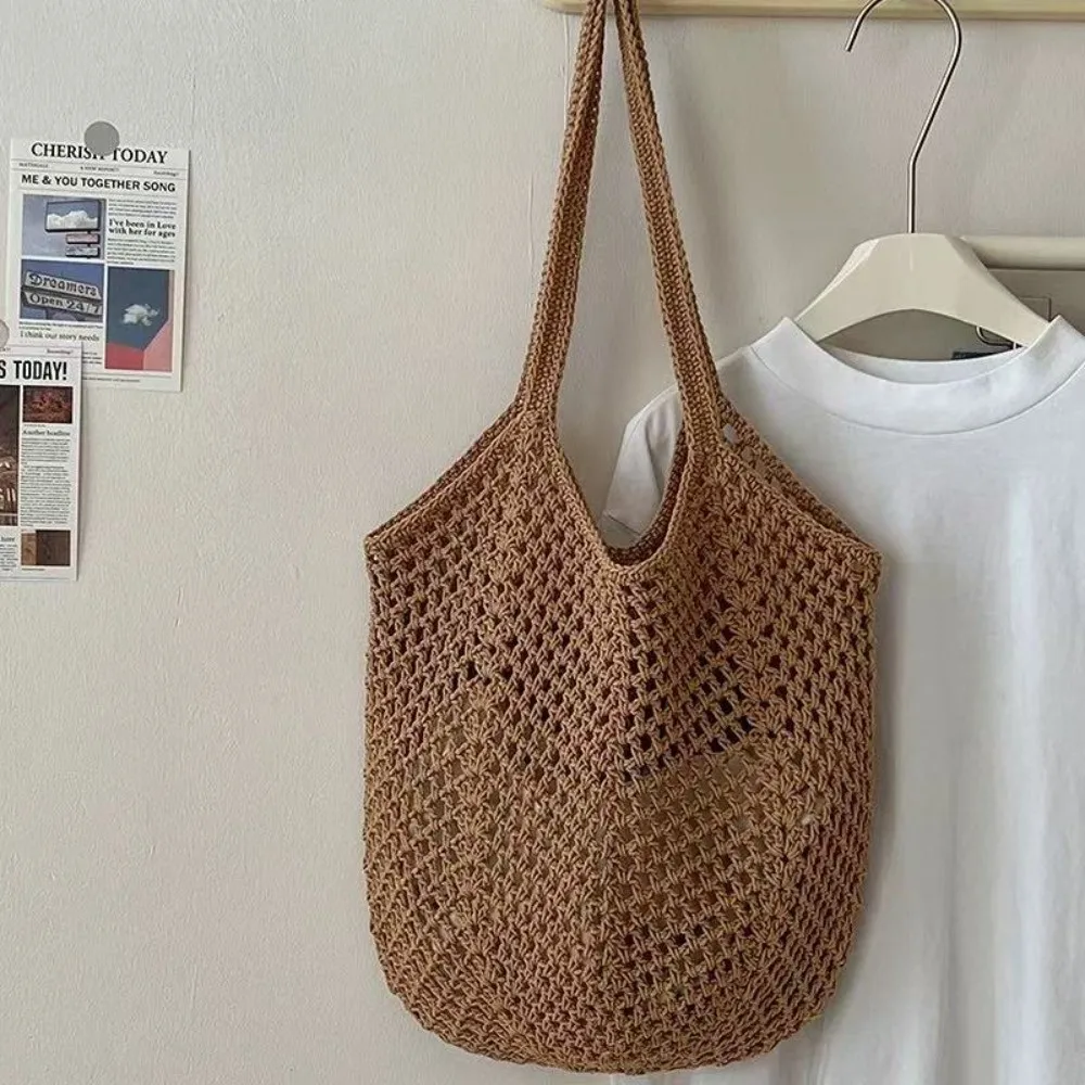 Solid Color Knitting Shoulder Bag Hollow Out Versatile Bohemian Crochet Tote Bag Elegant Large Capacity Casual Woven Handbag
Solid Color Knitting Shoulder Bag Hollow Out Versatile Bohemian Crochet Tote Bag Elegant Large Capacity Casual Woven Handbag