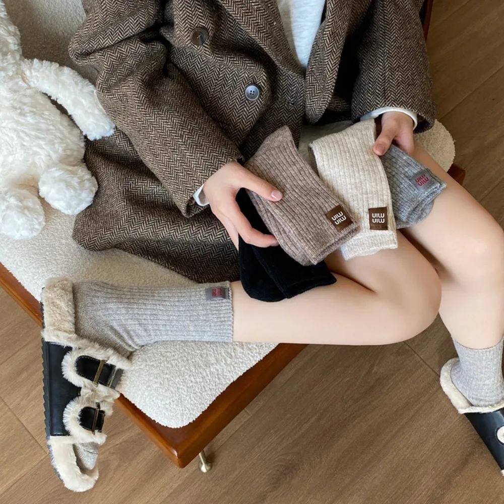 New Thicken Knitted Socks Mid-tube Heel Label Middle Tube Socks Solid Color Women's Socks
New Thicken Knitted Socks Mid-tube Heel Label Middle Tube Socks Solid Color Women's Socks
