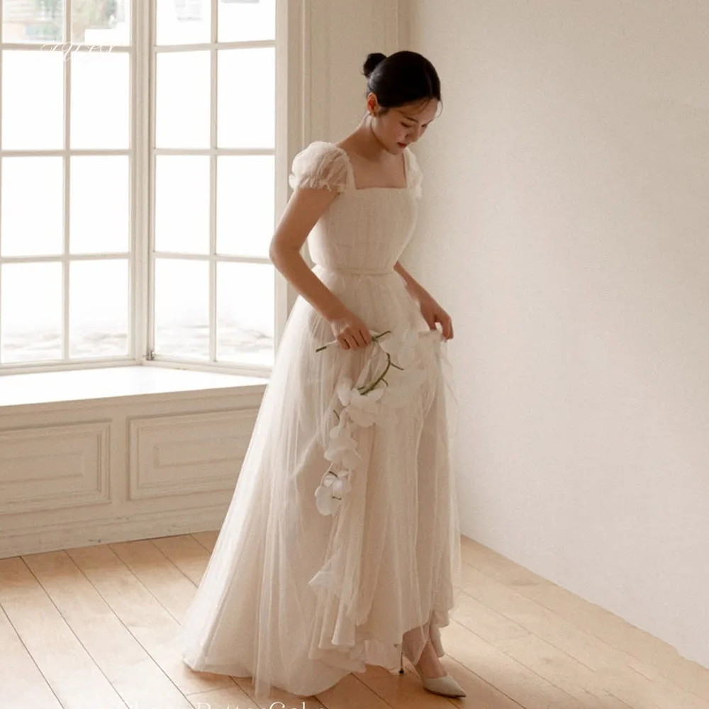TULX Elegant Ivory Tulle Wedding Dress Korea Photo Shoot Square Collar Short Sleeves Bridal Gowns A line Long Corset Customized
TULX Elegant Ivory Tulle Wedding Dress Korea Photo Shoot Square Collar Short Sleeves Bridal Gowns A line Long Corset Customized