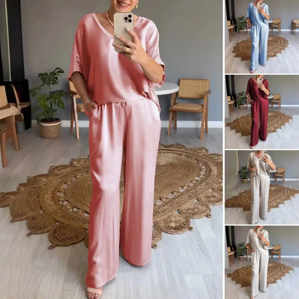 Женский однотонный атласный комплект из 2 предметов, футболка с коротким рукавом + прямые брюки, мягкий костюм для отдыха, женские свободные повседневные Костюмы
Женский однотонный атласный комплект из 2 предметов, футболка с коротким рукавом + прямые брюки, мягкий костюм для отдыха, женские свободные повседневные Костюмы