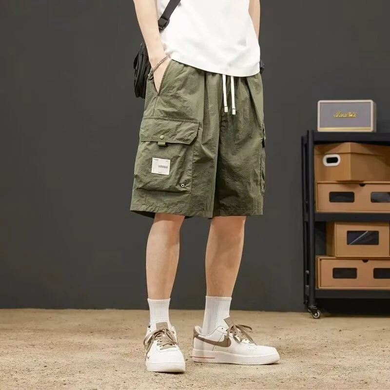 Summer Men's Beach Workwear Shorts with Large Pockets Quick-Dry Fabric Loose Fit Knee-Length for Outdoor Sports and Activities
Summer Men's Beach Workwear Shorts with Large Pockets Quick-Dry Fabric Loose Fit Knee-Length for Outdoor Sports and Activities
