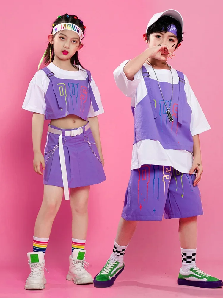 Детская одежда для джазовых уличных выступлений, танцевальный костюм в стиле хип-хоп для девочек, детская футболка с фиолетовым ремешком, топы, фиолетовая юбка, короткие штаны
Детская одежда для джазовых уличных выступлений, танцевальный костюм в стиле хип-хоп для девочек, детская футболка с фиолетовым ремешком, топы, фиолетовая юбка, короткие штаны