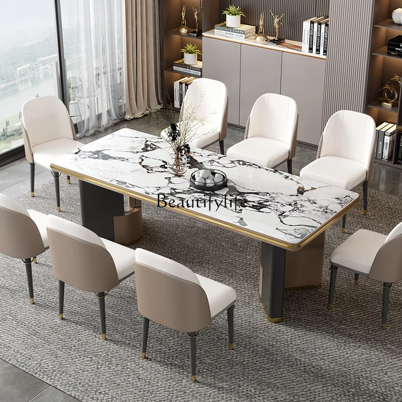 Light luxury rock slab dining table High-end modern villa Italian minimalist dining table
Light luxury rock slab dining table High-end modern villa Italian minimalist dining table