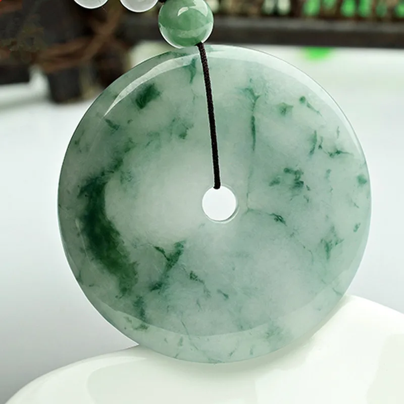 Myanmar Jadeite Jade Light Green Floral Pattern Peace Pendant Men And Women
Myanmar Jadeite Jade Light Green Floral Pattern Peace Pendant Men And Women