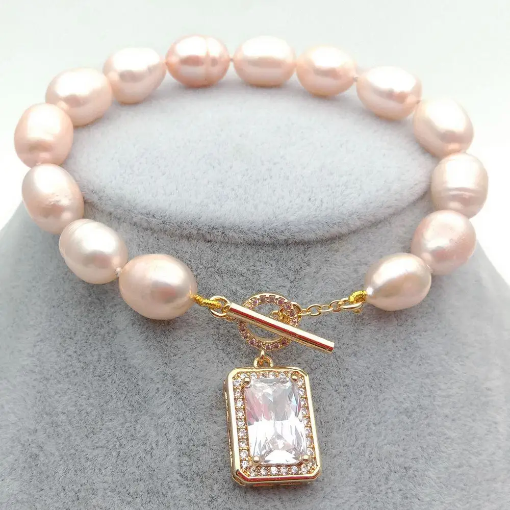 8'' Freshwater Pink Rice Pearl strand Bracelet Cubic Zirconia rectangle pave Toggle Clasp cute for women
8'' Freshwater Pink Rice Pearl strand Bracelet Cubic Zirconia rectangle pave Toggle Clasp cute for women