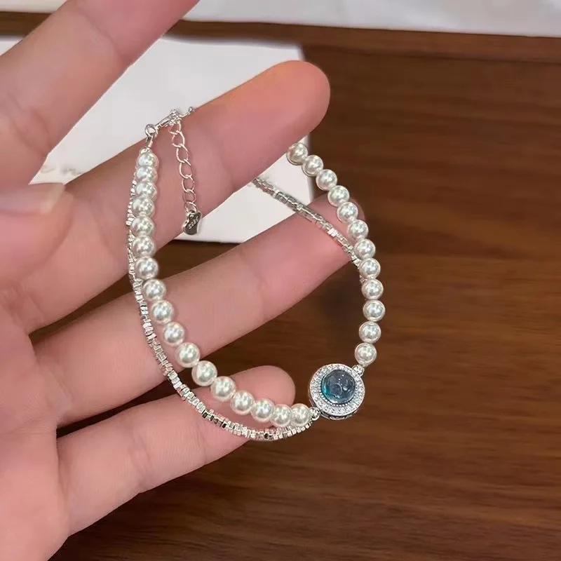 GXGlin Elegant Sea Blue Gemstone Pearl Bracelet with 925 Sterling Silver Perfect for Fashion Bloggers Luxury Bracelet for Women
GXGlin Elegant Sea Blue Gemstone Pearl Bracelet with 925 Sterling Silver Perfect for Fashion Bloggers Luxury Bracelet for Women