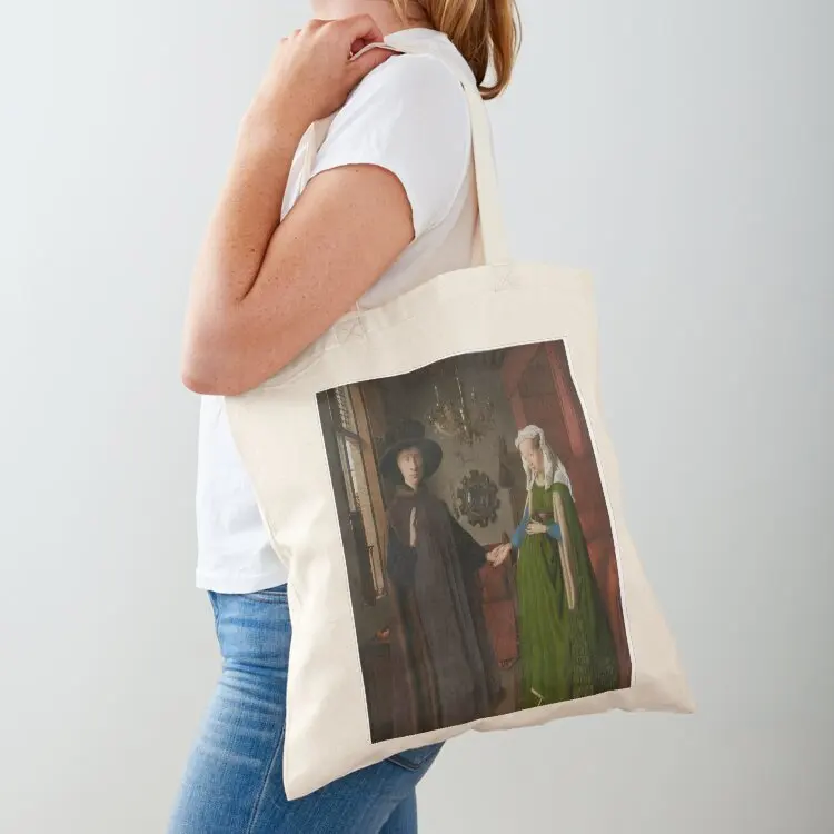 The Arnolfini Portrait (1434) - Jan van Eyck. Tote Bag Candy bags Shopping bags hand bag
The Arnolfini Portrait (1434) - Jan van Eyck. Tote Bag Candy bags Shopping bags hand bag