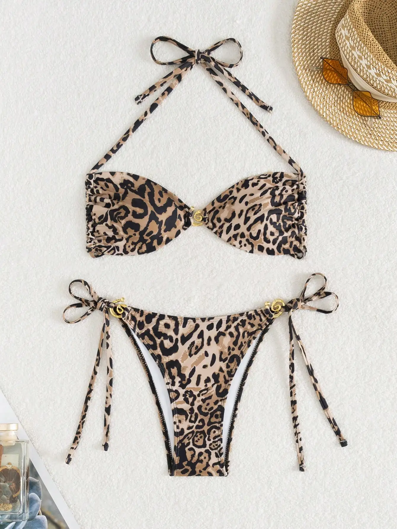 Leopard Print Halter Crop Top & Side Tie Bikini Set with Gold Accents
Leopard Print Halter Crop Top & Side Tie Bikini Set with Gold Accents