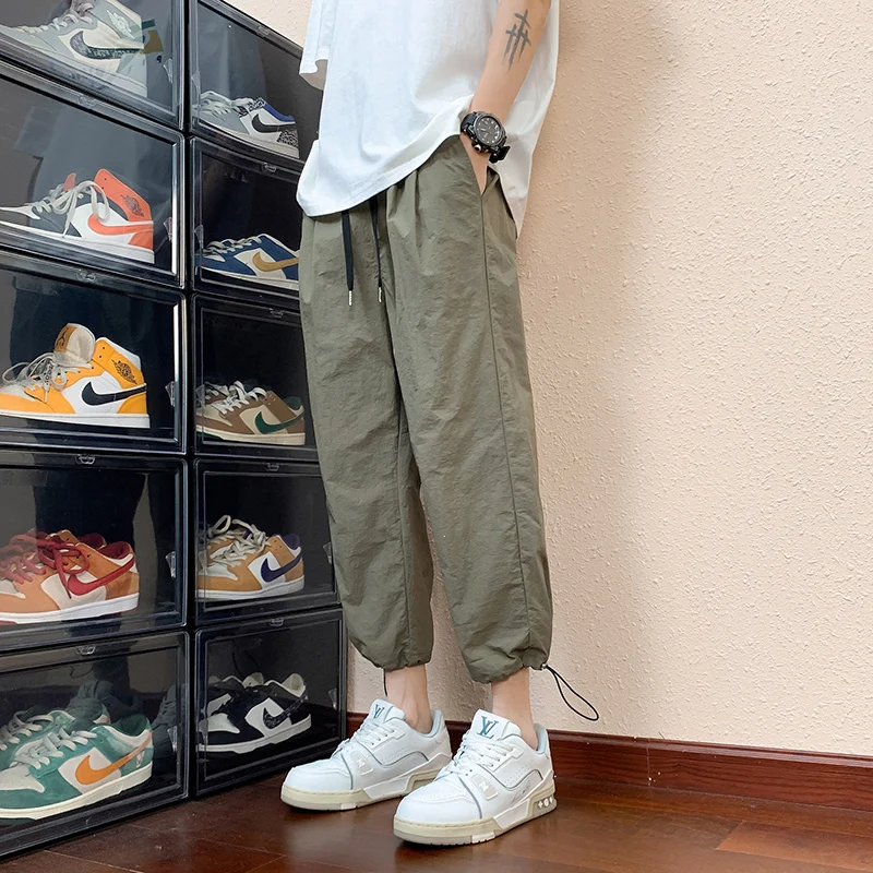 Ice Silk Men's Summer Loose Thin Seven-Eight Length Casual Sport Pants Classic Sle Nylon Fabric Cool Feeling Leisure Trousers
Ice Silk Men's Summer Loose Thin Seven-Eight Length Casual Sport Pants Classic Sle Nylon Fabric Cool Feeling Leisure Trousers