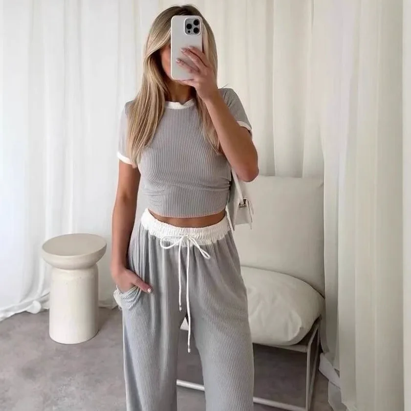 Fashionable Round Neck Contrasting Short Sleeved T-shirt Top Long Pants Fashionable Casual Wide Leg Pants Sports Suit For Women
Fashionable Round Neck Contrasting Short Sleeved T-shirt Top Long Pants Fashionable Casual Wide Leg Pants Sports Suit For Women