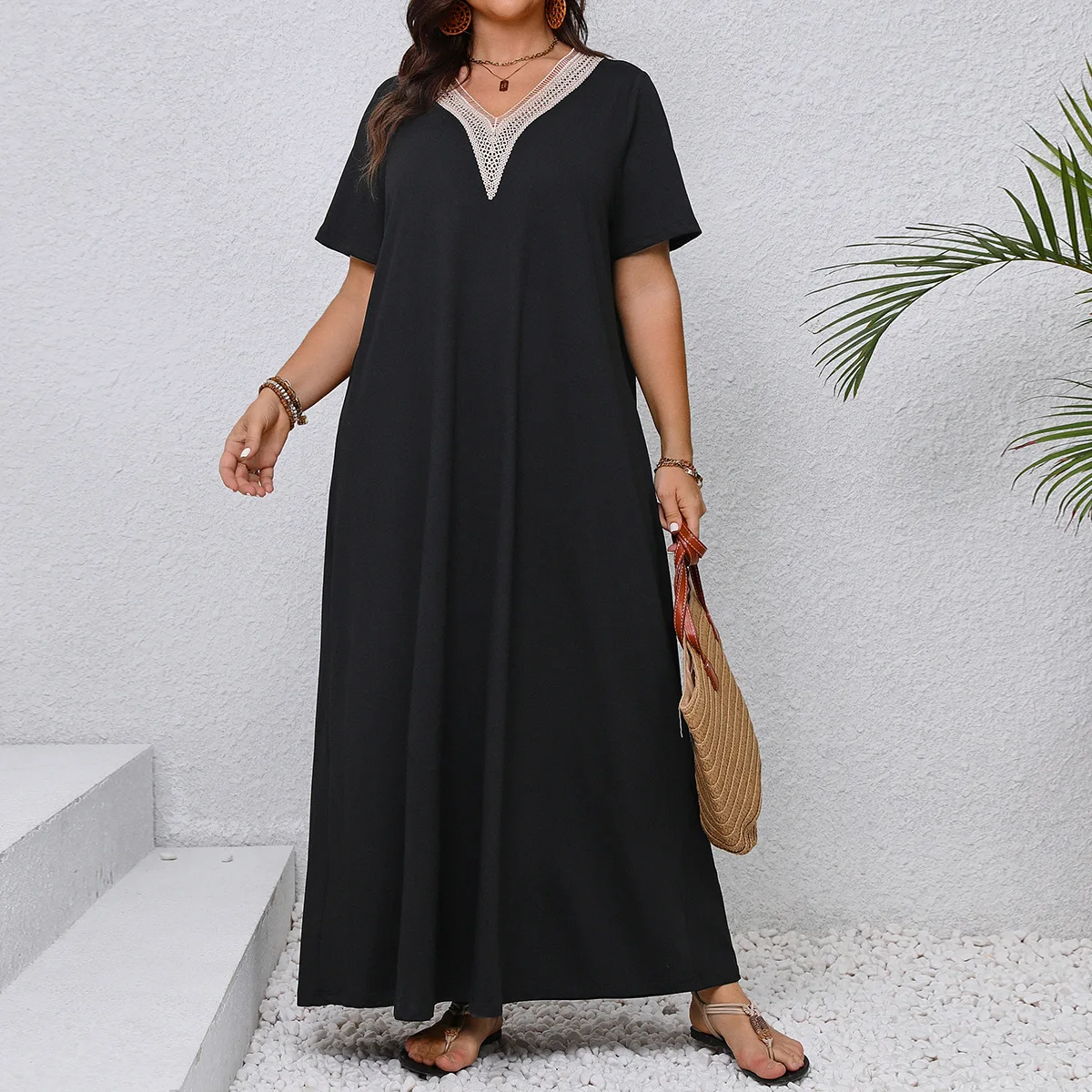 Summer new plus size V-neck slimming long skirt temperament black loose women's dress
Summer new plus size V-neck slimming long skirt temperament black loose women's dress