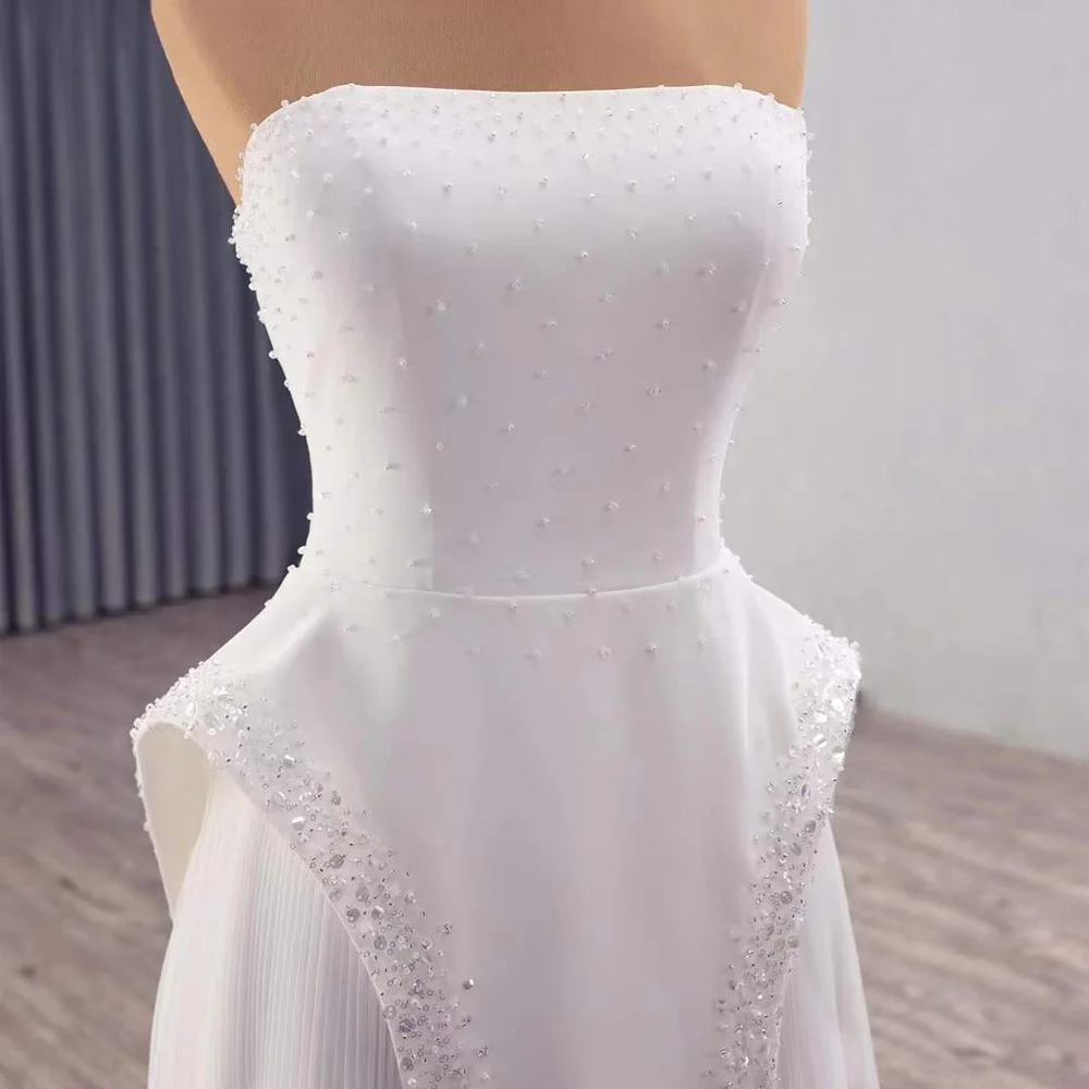 Bridal Dress 2026 Princesa Strapless Beading Crystal Lace Up Back Sexy Wedding Dress
Bridal Dress 2026 Princesa Strapless Beading Crystal Lace Up Back Sexy Wedding Dress