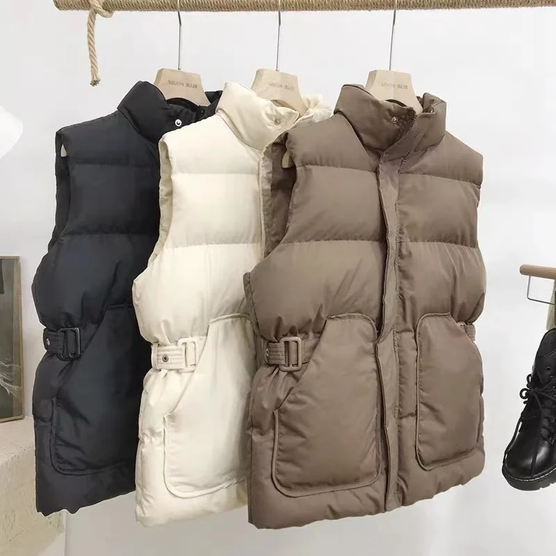 Stand Collar Belt Warm Vest Women Autumn Winter Slim Waist Cotton Waistcoat Solid Color Sleeveless Parka Fashion Ultralight Coat
Stand Collar Belt Warm Vest Women Autumn Winter Slim Waist Cotton Waistcoat Solid Color Sleeveless Parka Fashion Ultralight Coat