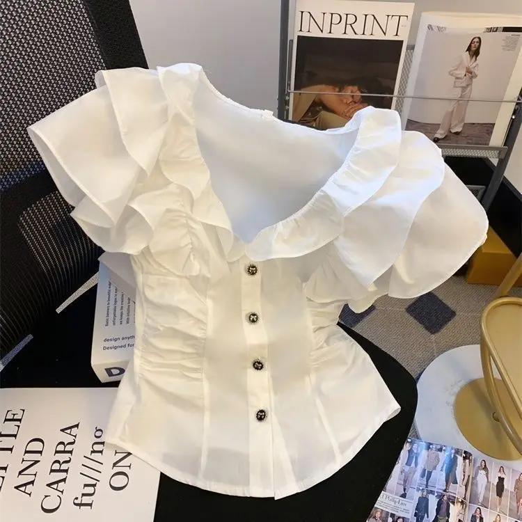 V-neck ruffle edge small flying sleeve shirt women's summer single-breasted design sense small waist and thin top 
V-neck ruffle edge small flying sleeve shirt women's summer single-breasted design sense small waist and thin top