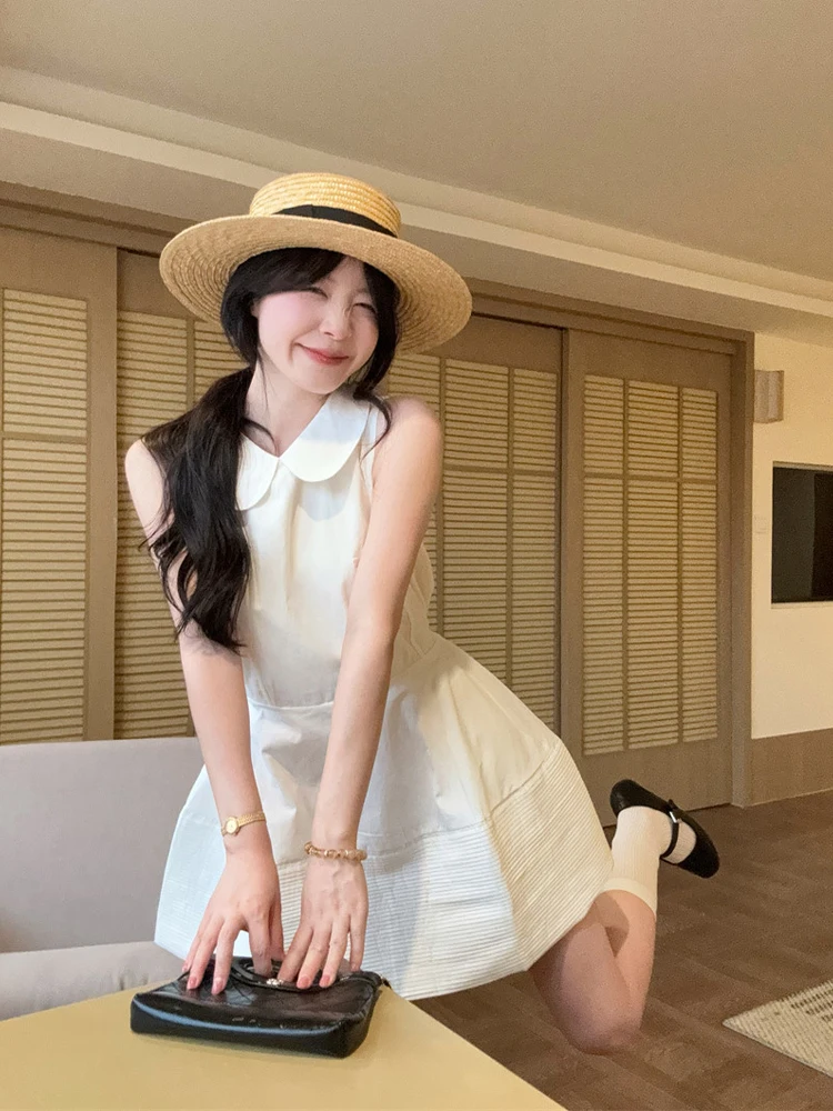 Summer New Korean Style Doll Collar Vest Dress Women's Slim A-Line Puffy Skirt Waist-Cinching Casual Dresses for Ladies
Summer New Korean Style Doll Collar Vest Dress Women's Slim A-Line Puffy Skirt Waist-Cinching Casual Dresses for Ladies