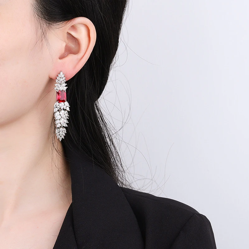 Gold-plated copper water drop zircon tassel earrings, ruby Paraiba fashion earrings, wholesale customization
Gold-plated copper water drop zircon tassel earrings, ruby Paraiba fashion earrings, wholesale customization