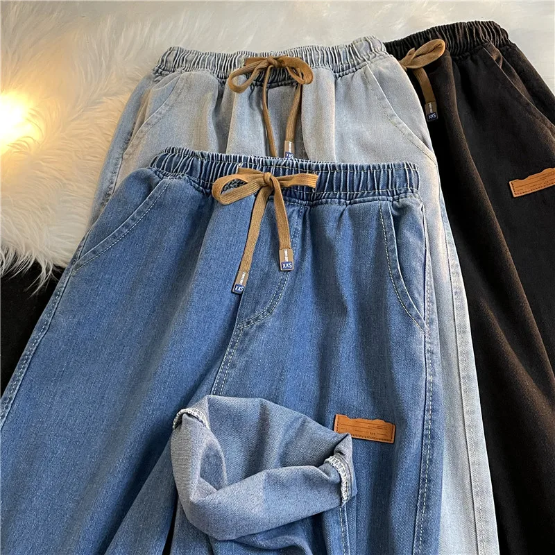 Свободные прямые мужские джинсы с эластичной резинкой на талии, повседневные длинные брюки с вышитым логотипом, рабочая одежда, модные простые брюки
Свободные прямые мужские джинсы с эластичной резинкой на талии, повседневные длинные брюки с вышитым логотипом, рабочая одежда, модные простые брюки